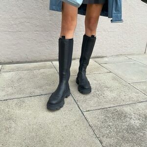 Tall black boots